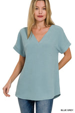 WOVEN AIRFLOW HI-LOW HEM TOP