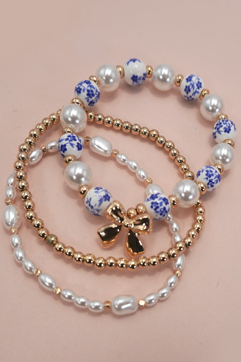 Faithlyn's Ceramic Porcelain Bow Multi-Layer Bracelet